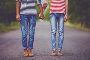 two people holding hands